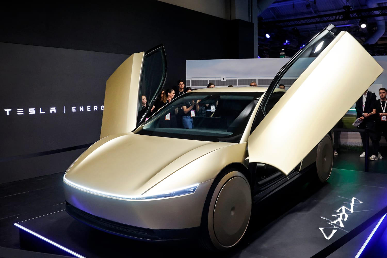 Cybercab with falcon-wing doors open
